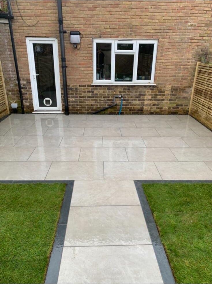 AMG Landscapes porcelain patio with lawn borders and garden walkway